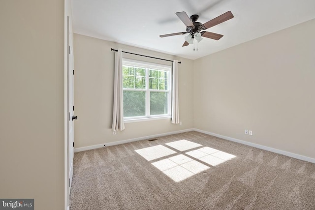 10811 Honorable Ct, Spotsylvania, VA 22553 - spare room featuring carpet flooring, baseboards, and ceiling fan