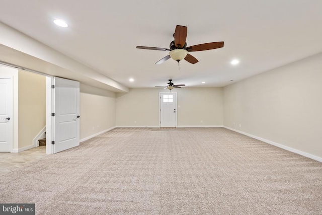10811 Honorable Ct, Spotsylvania, VA 22553 - below grade area with light colored carpet, ceiling fan, baseboards, recessed lighting, and stairs