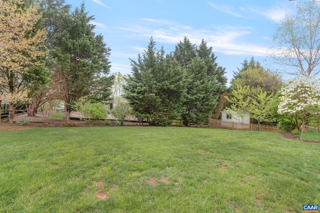 view of yard with fence