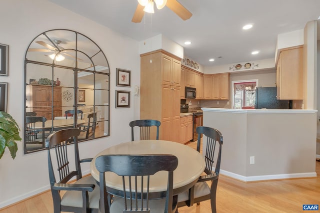 dining space with baseboards, light wood-style flooring, a ceiling fan, and recessed lighting