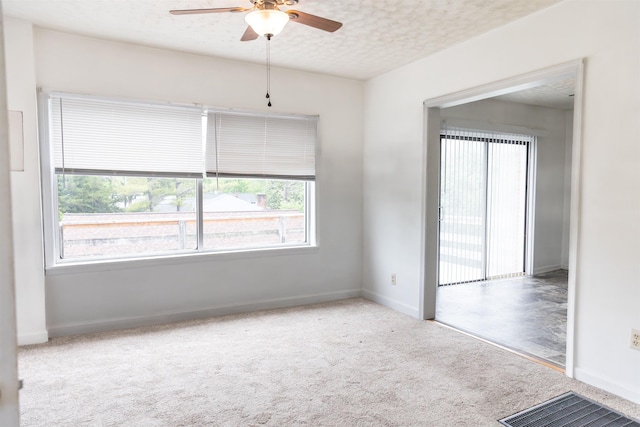 708 Mccorkle Dr, Lexington, VA 24450 - spare room with ceiling fan, a textured ceiling, carpet floors, and baseboards