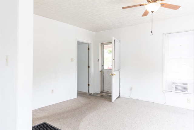 708 Mccorkle Dr, Lexington, VA 24450 - spare room featuring light carpet and a ceiling fan