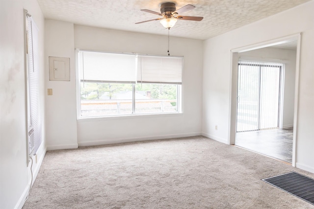 708 Mccorkle Dr, Lexington, VA 24450 - empty room with carpet, ceiling fan, a textured ceiling, and baseboards
