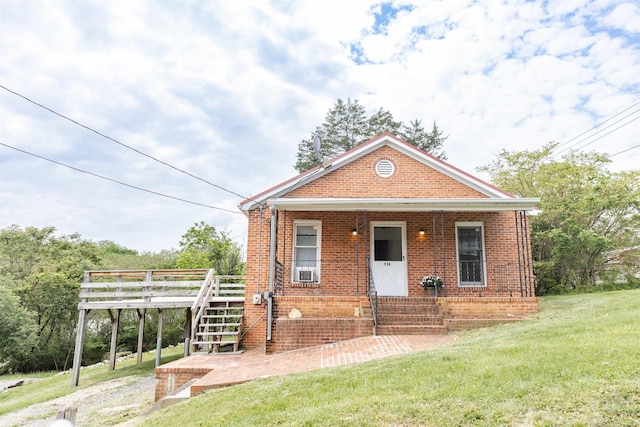 708 Mccorkle Dr, Lexington, VA 24450 - view of front of home featuring brick siding, a front yard, stairway, and a wooden deck