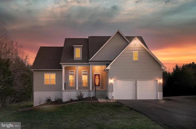 26368 Pennfields Dr, Orange, VA 22960 - traditional-style house featuring a front yard, roof with shingles, aphalt driveway, and covered porch