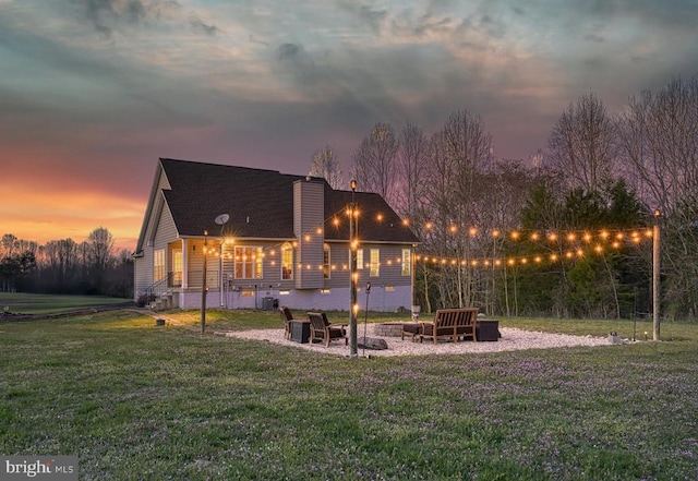 26368 Pennfields Dr, Orange, VA 22960 - rear view of property featuring a fire pit, a chimney, and a lawn