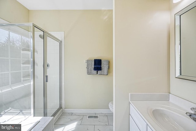 26368 Pennfields Dr, Orange, VA 22960 - bathroom featuring toilet, baseboards, a shower stall, marble finish floor, and vanity