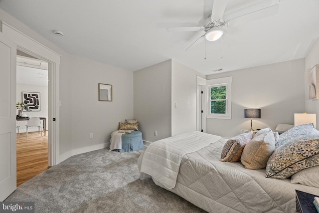  - bedroom with carpet flooring and a ceiling fan
