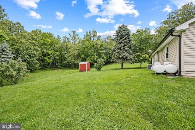  - view of green lawn with a storage unit