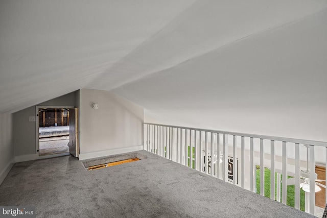  - bonus room with lofted ceiling and carpet