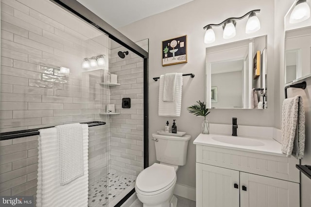  - full bath featuring a shower stall and vanity