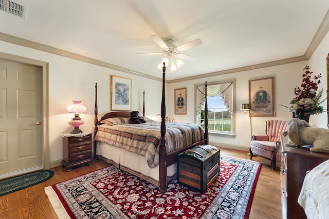 273 Bel Grene Dr, Fishersville, VA 22939 - bedroom featuring baseboards, ornamental molding, visible vents, and wood finished floors