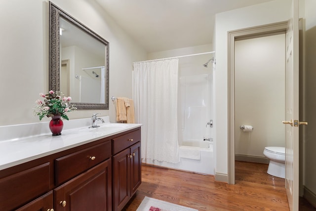 273 Bel Grene Dr, Fishersville, VA 22939 - full bathroom featuring toilet, wood finished floors, vanity, and shower / bathtub combination with curtain
