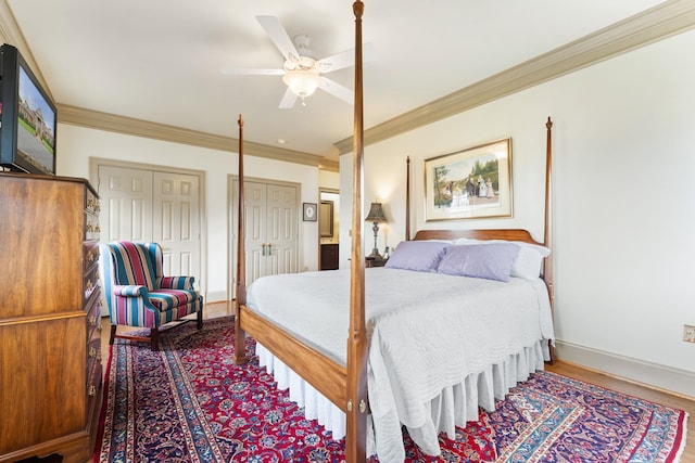 273 Bel Grene Dr, Fishersville, VA 22939 - bedroom with wood finished floors, ornamental molding, two closets, ceiling fan, and baseboards