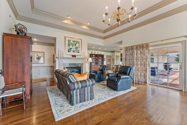 273 Bel Grene Dr, Fishersville, VA 22939 - living area featuring a chandelier, wood finished floors, ornamental molding, and a high end fireplace