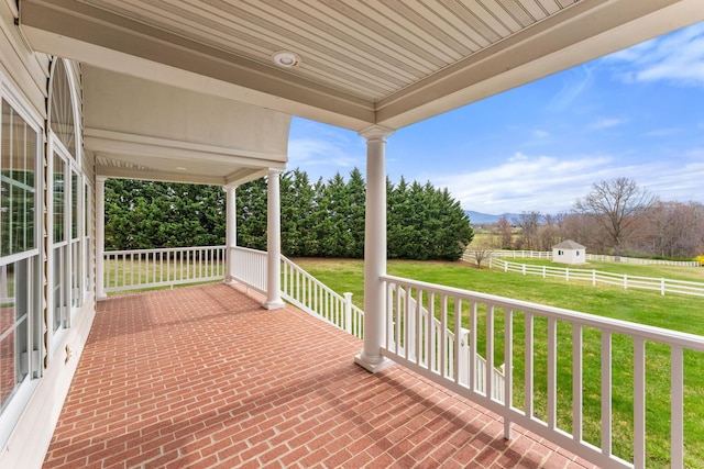 273 Bel Grene Dr, Fishersville, VA 22939 - wooden terrace with covered porch, a mountain view, fence, and a lawn