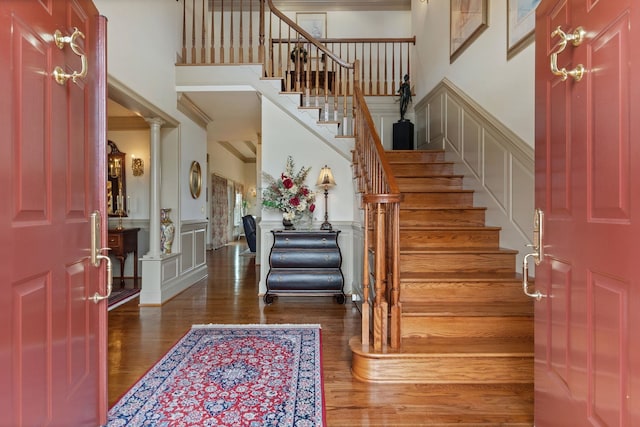 273 Bel Grene Dr, Fishersville, VA 22939 - entryway featuring wainscoting, stairs, a decorative wall, and wood finished floors
