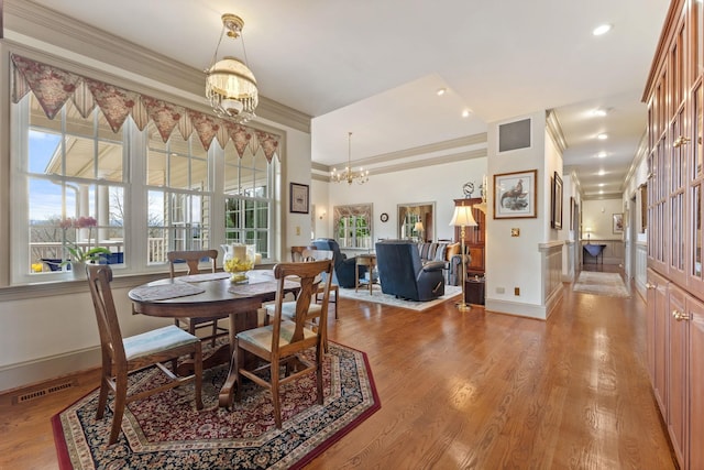 273 Bel Grene Dr, Fishersville, VA 22939 - dining room with crown molding, a notable chandelier, baseboards, and visible vents