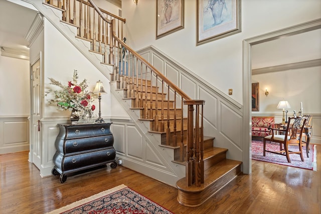 273 Bel Grene Dr, Fishersville, VA 22939 - stairway featuring wood finished floors, a decorative wall, wainscoting, and ornamental molding