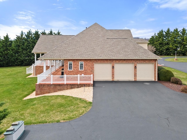 273 Bel Grene Dr, Fishersville, VA 22939 - exterior space featuring aphalt driveway, brick siding, a yard, a garage, and a shingled roof