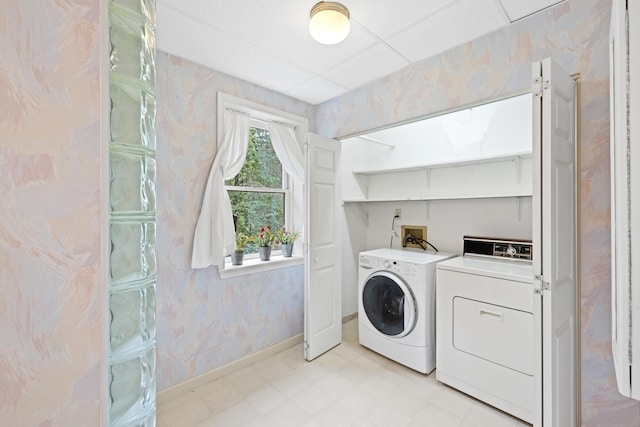409 Thomas St, Staunton, VA 24401 - laundry room with independent washer and dryer, light flooring, baseboards, and wallpapered walls