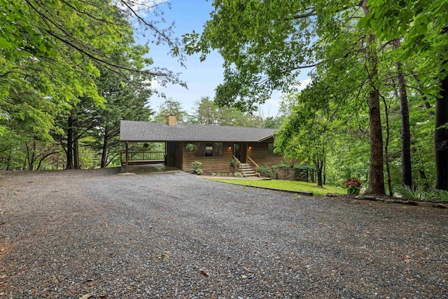 409 Thomas St, Staunton, VA 24401 - rustic home with gravel driveway, a chimney, and a shingled roof