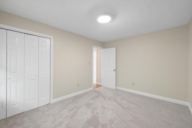 409 Thomas St, Staunton, VA 24401 - unfurnished bedroom with carpet, baseboards, and a closet