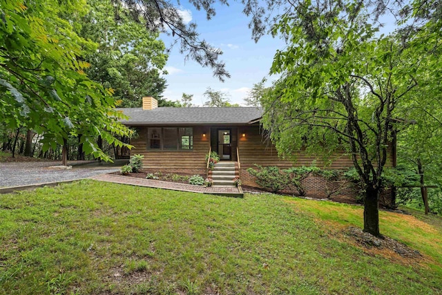 409 Thomas St, Staunton, VA 24401 - view of front of property with a front lawn, a chimney, and gravel driveway