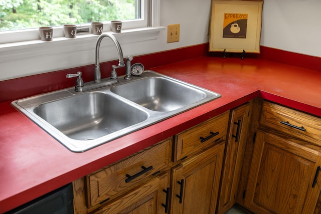 409 Thomas St, Staunton, VA 24401 - kitchen featuring a sink and brown cabinets