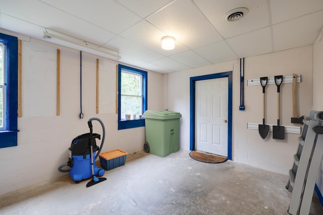 409 Thomas St, Staunton, VA 24401 - below grade area featuring a paneled ceiling and concrete block wall
