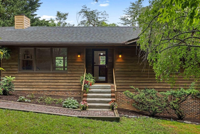 409 Thomas St, Staunton, VA 24401 - view of front facade featuring a shingled roof and a chimney