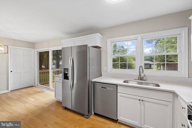 809 Sherwood Ln, Fredericksburg, VA 22407 - kitchen featuring appliances with stainless steel finishes, light countertops, and healthy amount of natural light