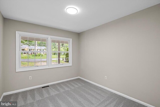 809 Sherwood Ln, Fredericksburg, VA 22407 - carpeted spare room with baseboards
