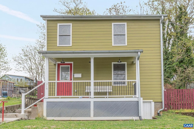 316 6 1/2 St, Charlottesville, VA 22903 - view of front facade featuring a porch and fence
