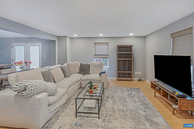 316 6 1/2 St, Charlottesville, VA 22903 - living area with light wood-type flooring, recessed lighting, and baseboards