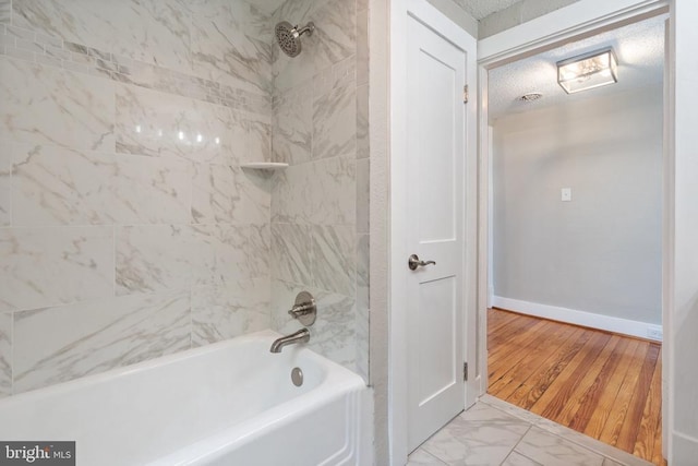 105 Washington St E, Remington, VA 22734 - full bathroom with shower / bathtub combination, marble look tile flooring, and a textured ceiling