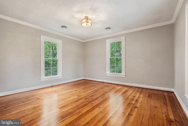 105 Washington St E, Remington, VA 22734 - spare room with hardwood / wood-style flooring, baseboards, ornamental molding, and a textured ceiling