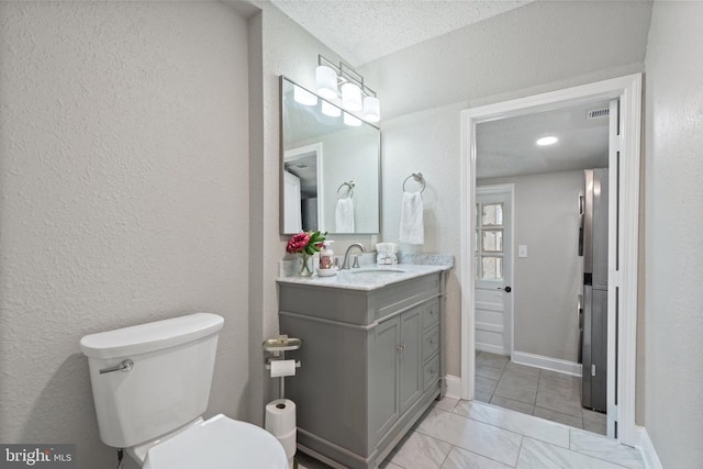 105 Washington St E, Remington, VA 22734 - bathroom with vanity and a textured wall