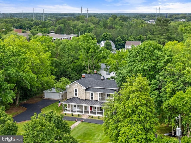 105 Washington St E, Remington, VA 22734 - view from above of property with a heavily wooded area