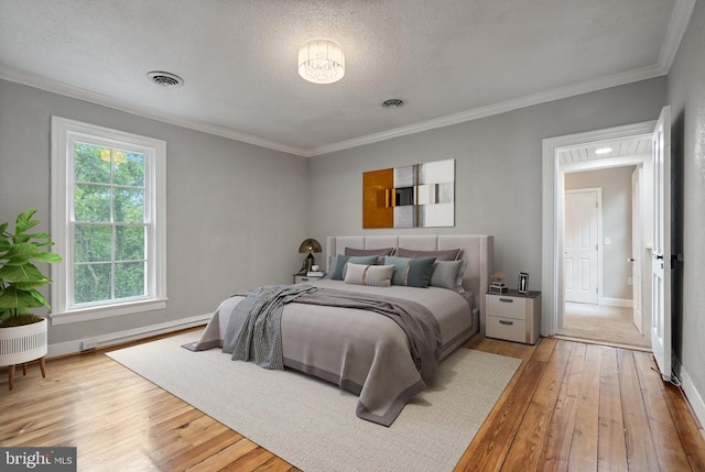 105 Washington St E, Remington, VA 22734 - bedroom featuring hardwood / wood-style floors, ornamental molding, and a textured ceiling