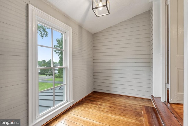 105 Washington St E, Remington, VA 22734 - empty room featuring vaulted ceiling and wood-type flooring