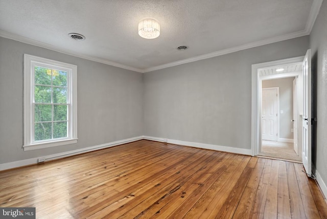 105 Washington St E, Remington, VA 22734 - empty room with hardwood / wood-style floors, ornamental molding, baseboards, and a textured ceiling