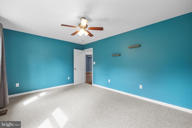  - unfurnished bedroom with carpet floors and a ceiling fan