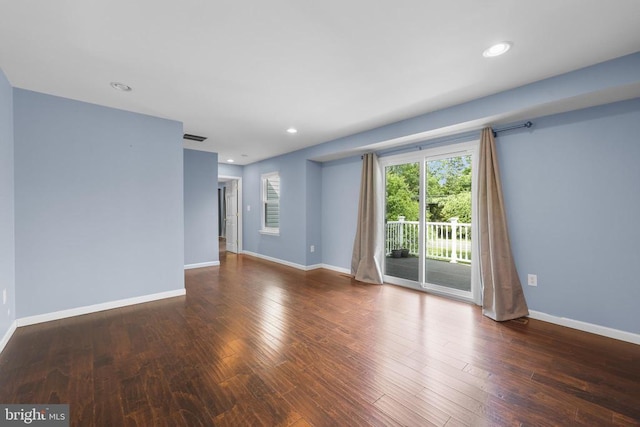  - unfurnished room with wood finished floors and recessed lighting