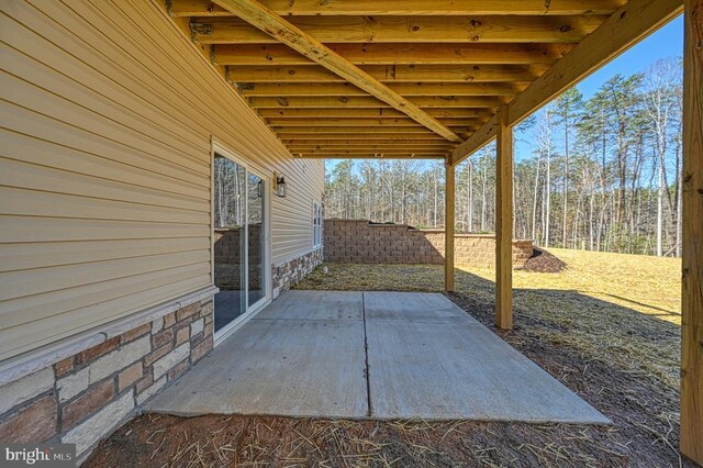 view of patio / terrace featuring fence