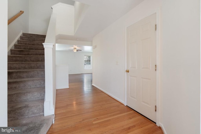 12303 Osprey Ln, Culpeper, VA 22701 - hallway featuring light wood-style floors and stairway
