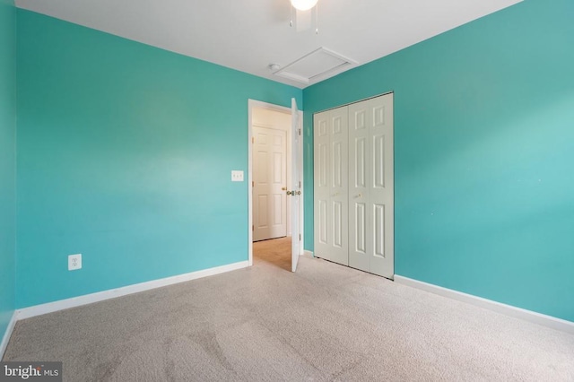12303 Osprey Ln, Culpeper, VA 22701 - unfurnished bedroom featuring a closet, baseboards, carpet flooring, and attic access