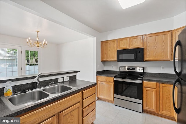 12303 Osprey Ln, Culpeper, VA 22701 - kitchen featuring black appliances, a chandelier, light tile patterned floors, a sink, and dark countertops