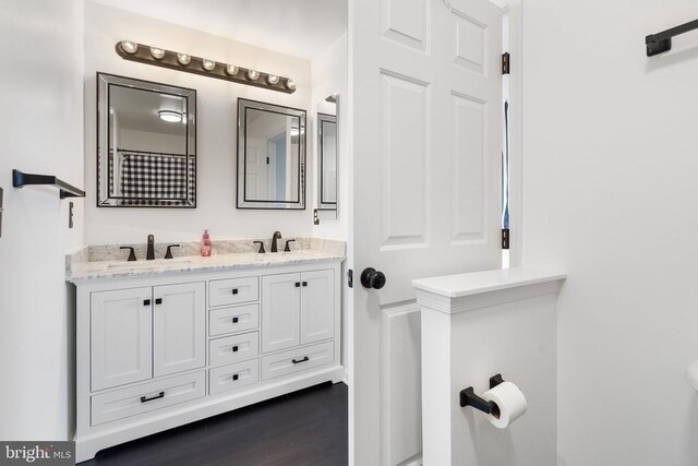 12303 Osprey Ln, Culpeper, VA 22701 - full bath with double vanity and wood finished floors
