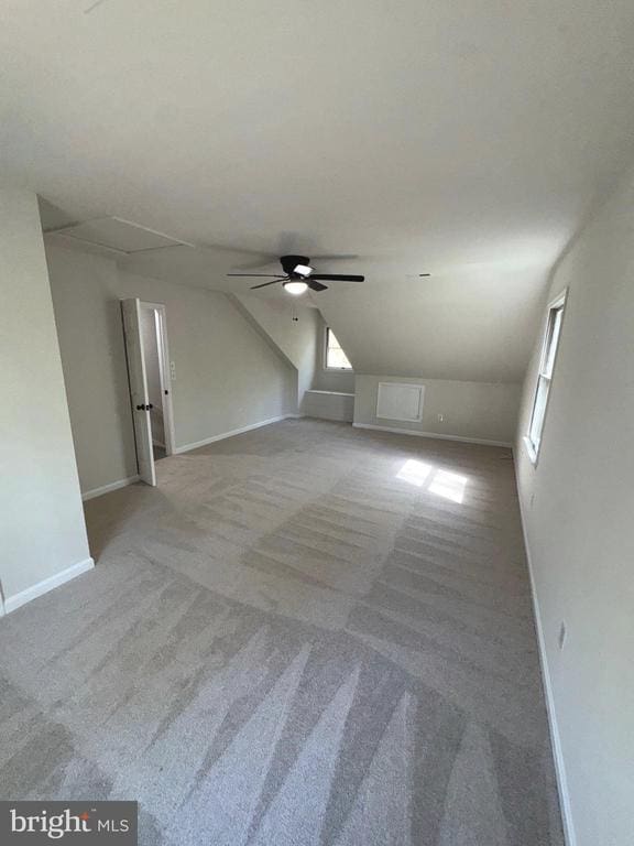 12704 Getty Ln, Spotsylvania, VA 22551 - additional living space with carpet floors, attic access, a ceiling fan, and lofted ceiling